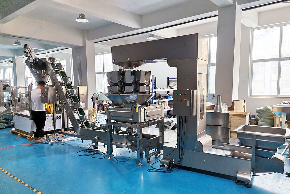 組合秤自動(dòng)稱(chēng)重包裝機(jī)是一種集成多斗組合稱(chēng)重與自動(dòng)包裝功能的自動(dòng)化包裝設(shè)備 組合秤自動(dòng)稱(chēng)重包裝機(jī)是一種集成多斗組合稱(chēng)重與自動(dòng)包裝功能的自動(dòng)化包裝設(shè)備